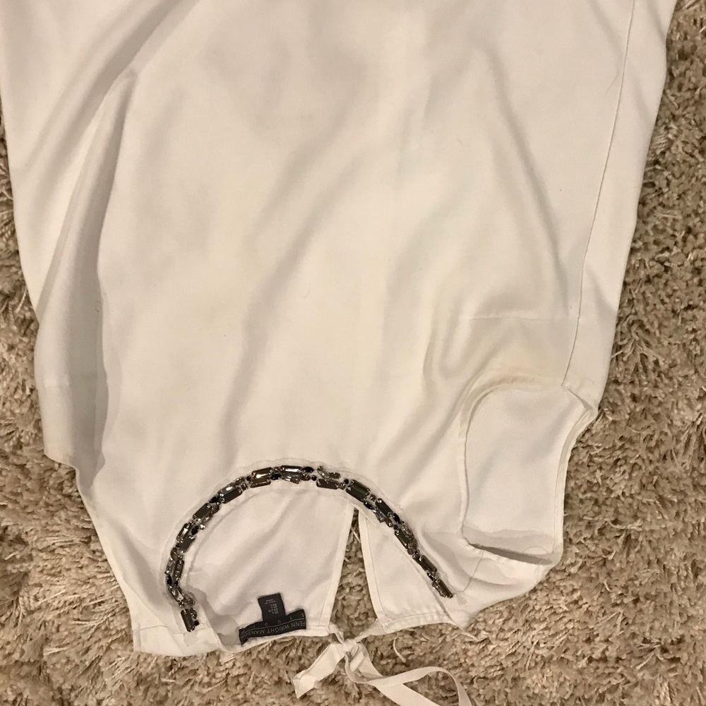 White tunic with gemstone neck line